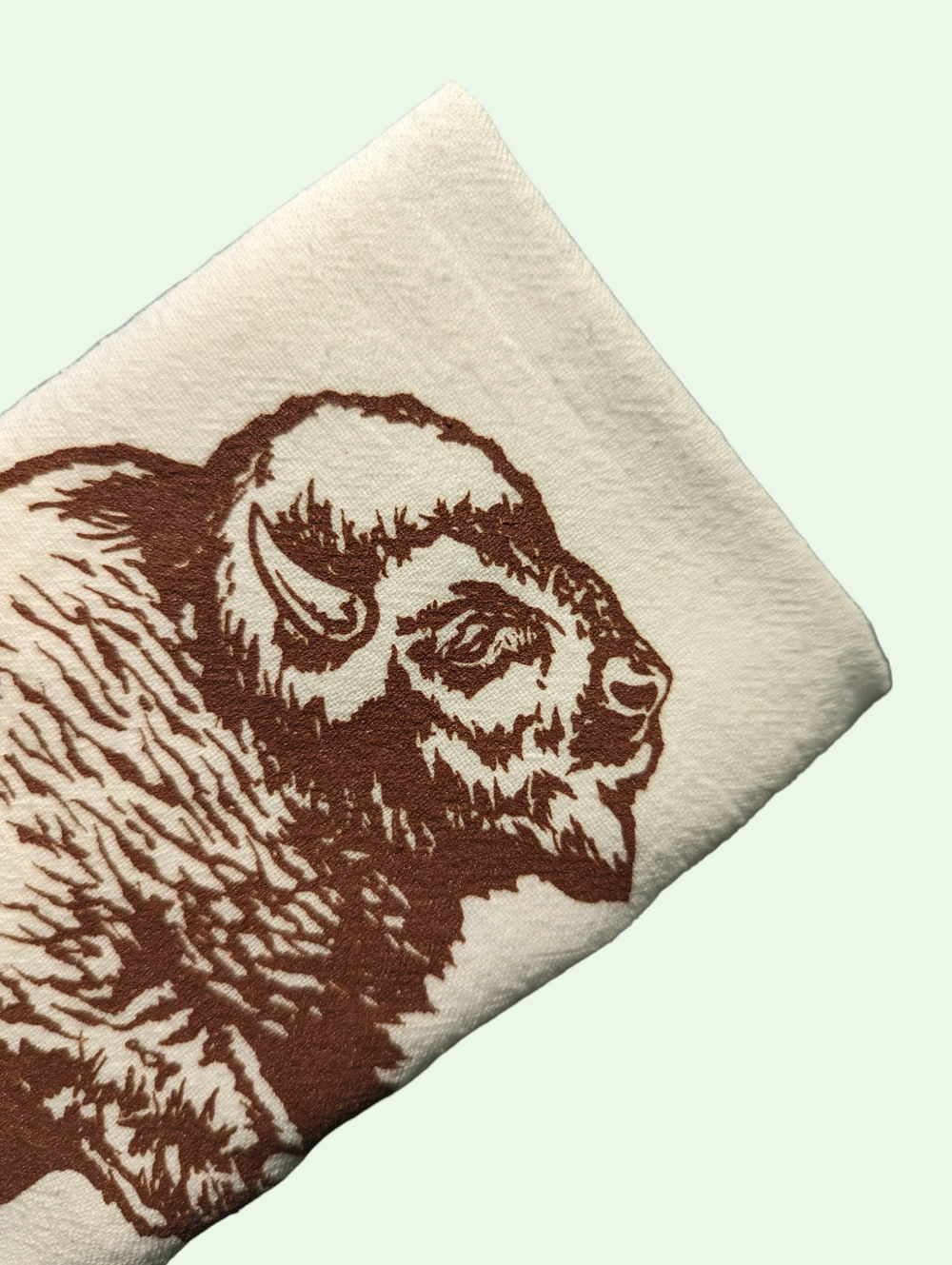 a detail shot of the bison dish towel