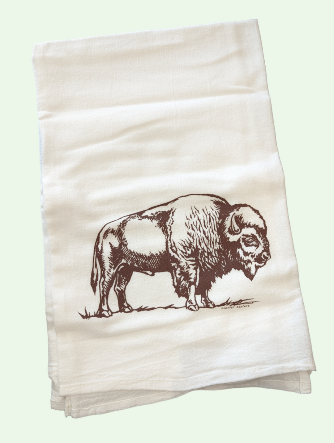 a flat lay of the bison dish towel