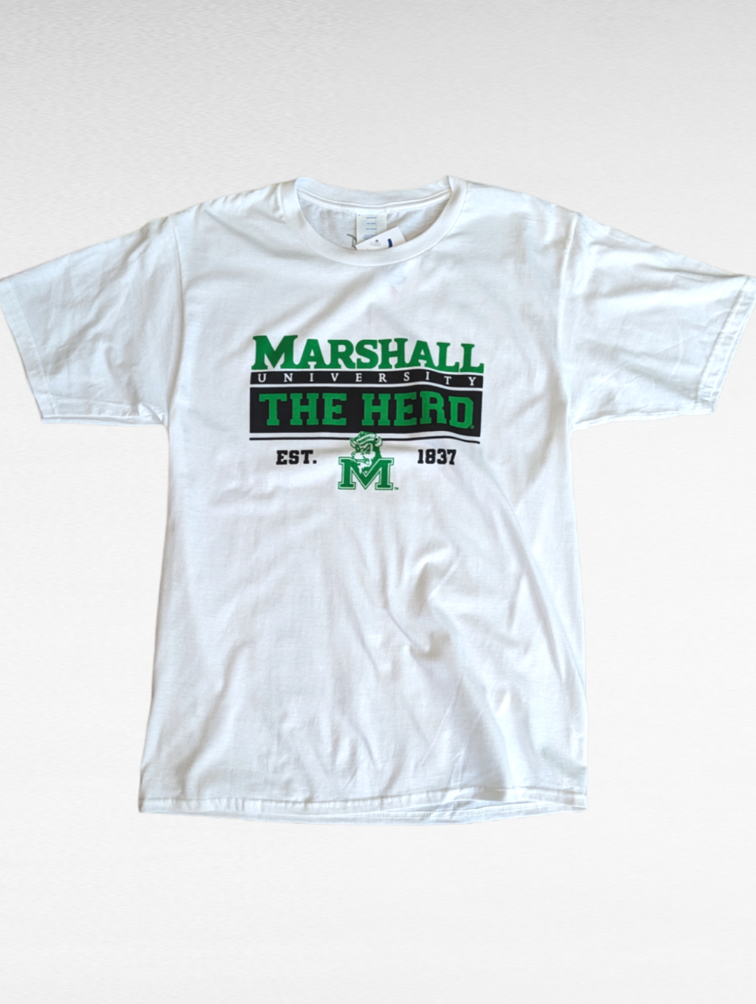 the fan fave tee is white with a green marshall over a black university bar over a green and black the herd bar over snorting sailor marco