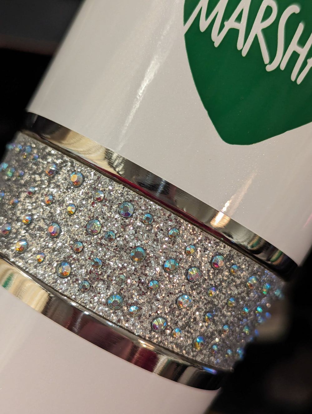 a close-up of the rhinestone decoraton on the middle of the tumber and the  printed marshall logo
