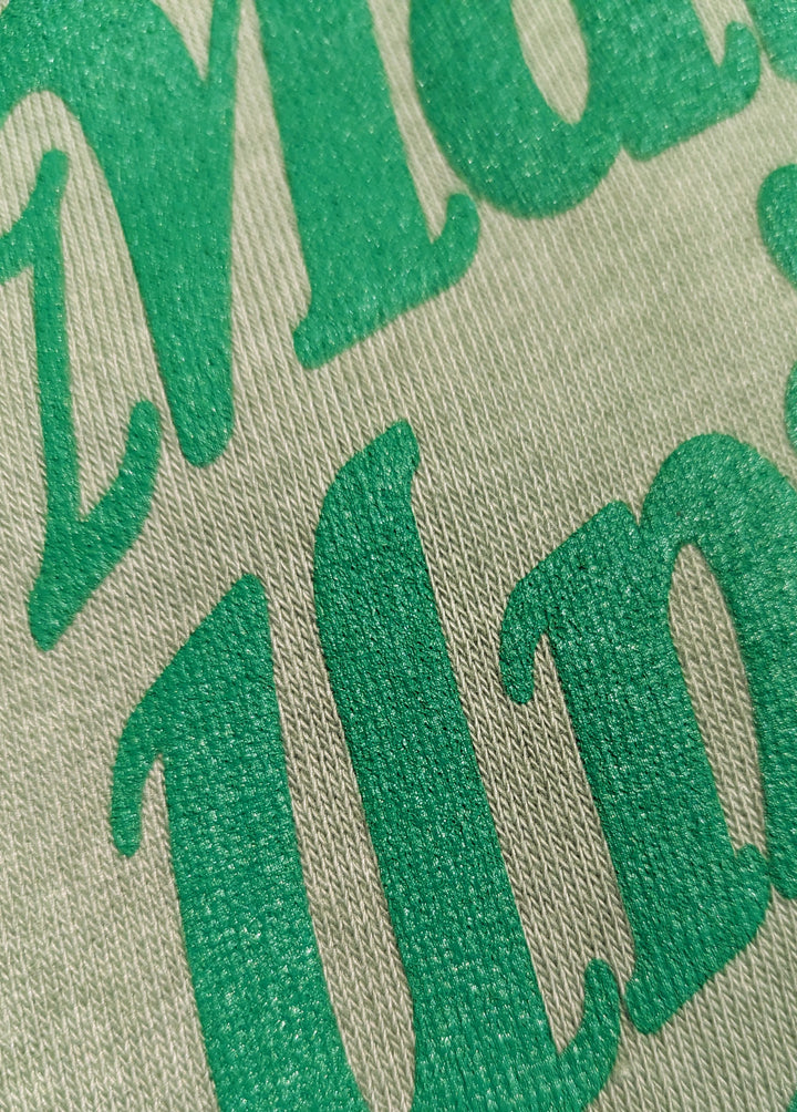 a close up of the marshall beachy crew showing the screenprint letters