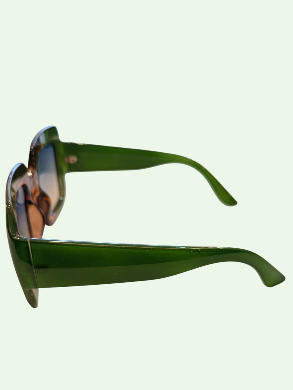 side view of the oversized green tortoise frames