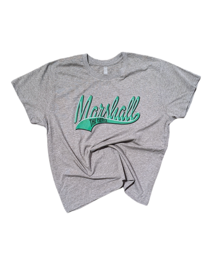  a flat lay of the marshall tina tee showing the logo but with the bottom of the tee twisted a bit to add visual interest to what is a basic tee shirt shape