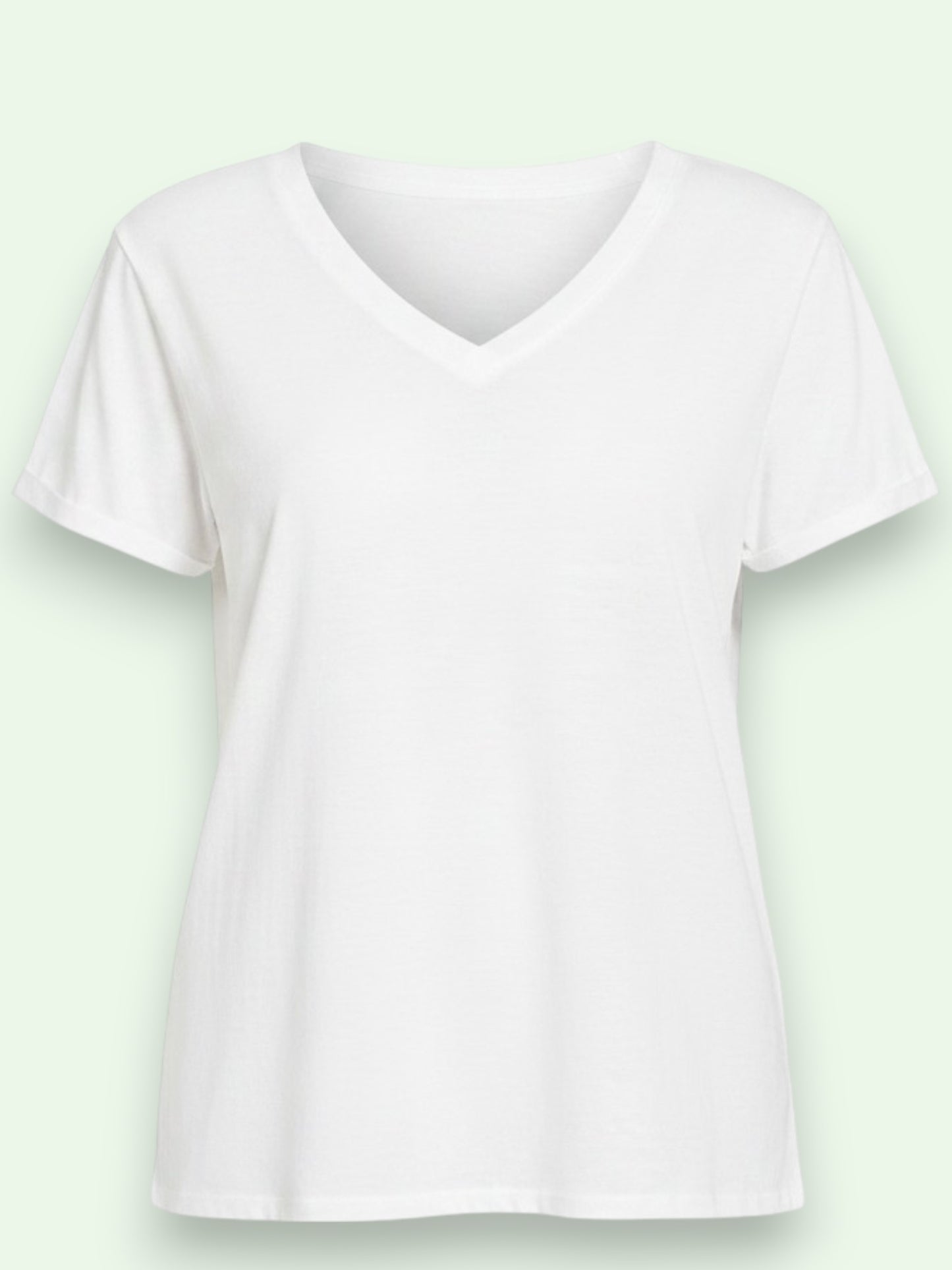 White t-shirt on a light green background