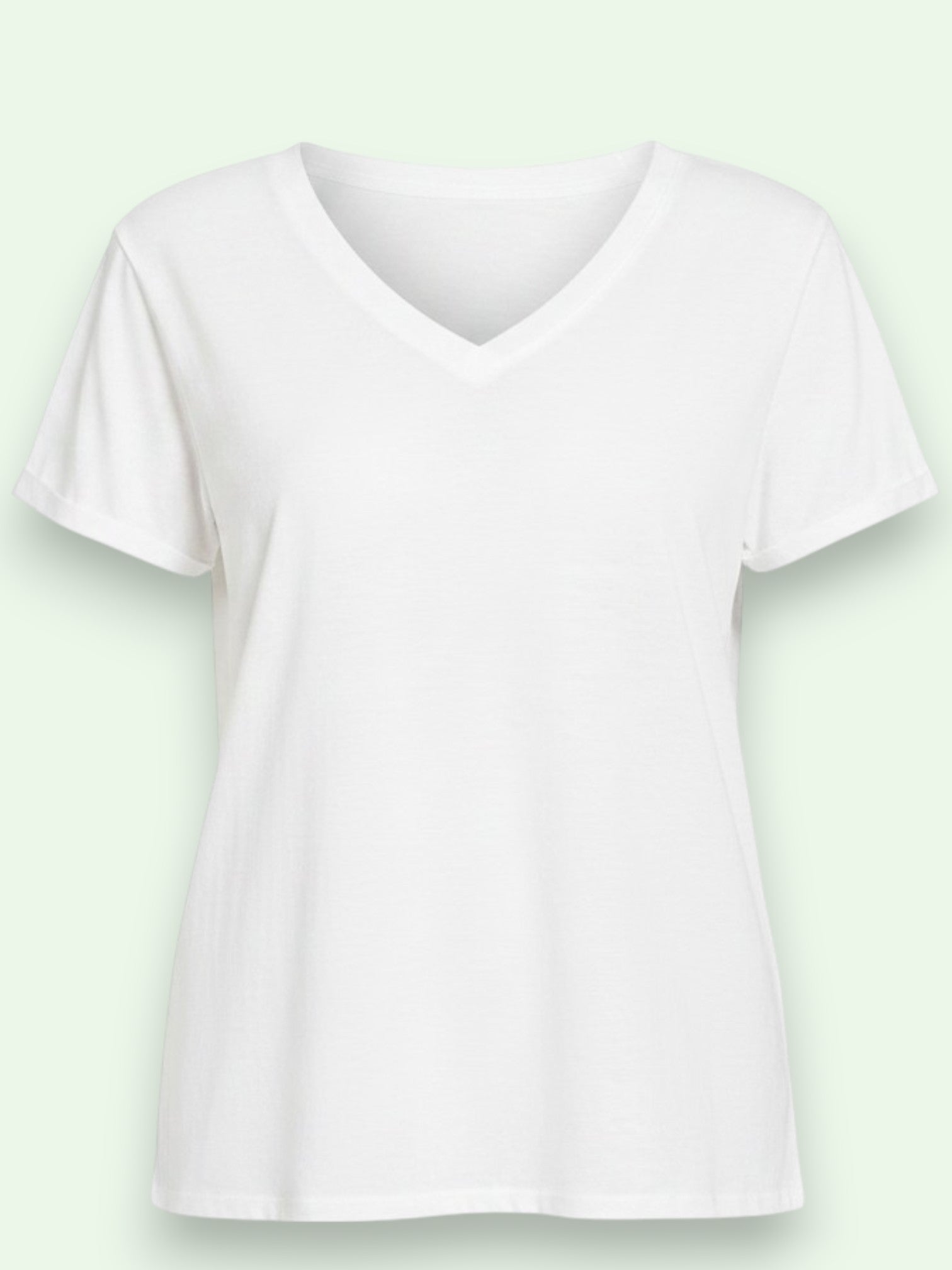 White t-shirt on a light green background