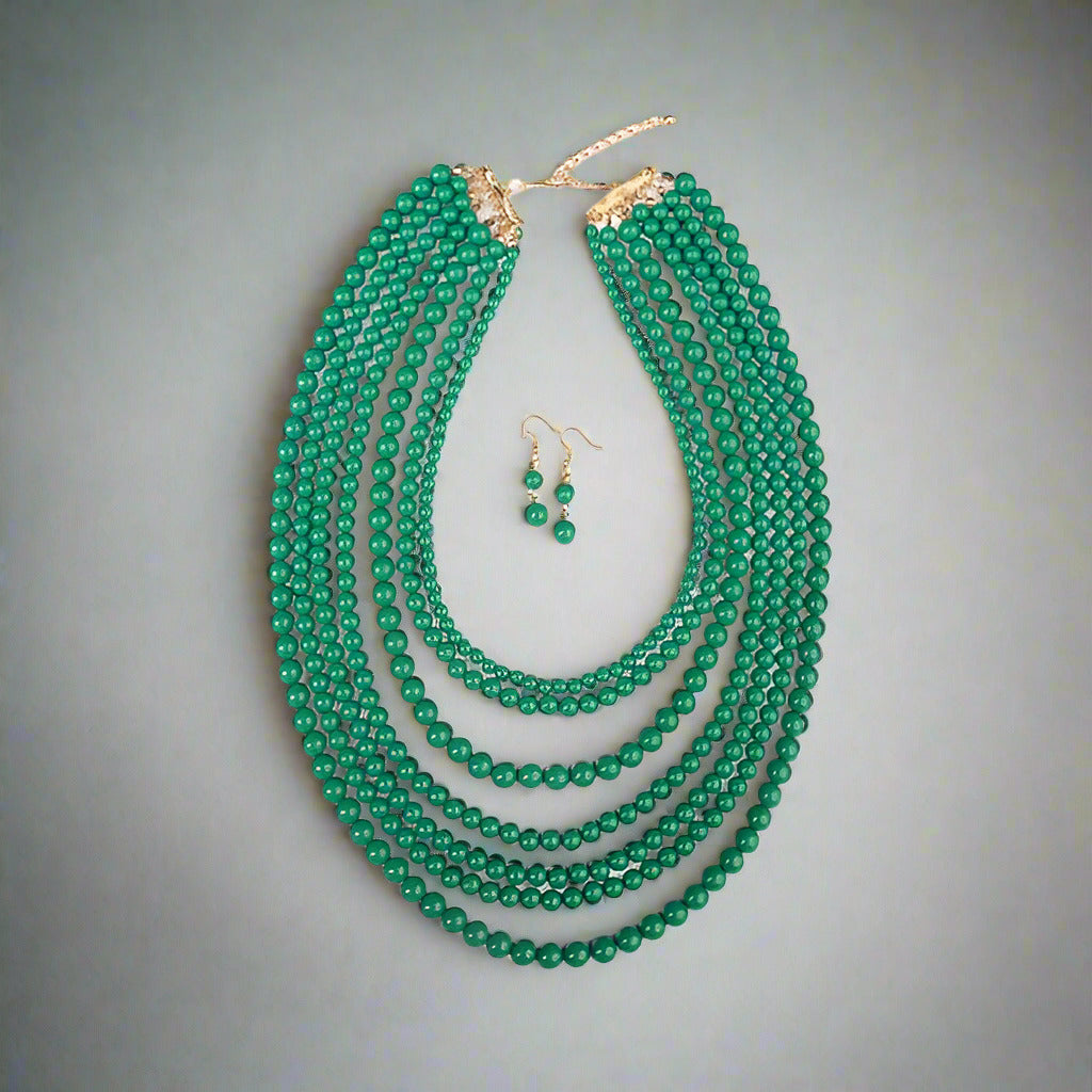 studio flat lay of the 7 layer beaded necklace