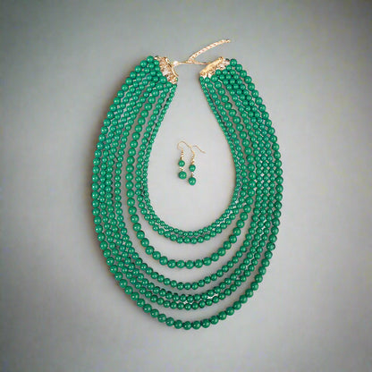 studio flat lay of the 7 layer beaded necklace