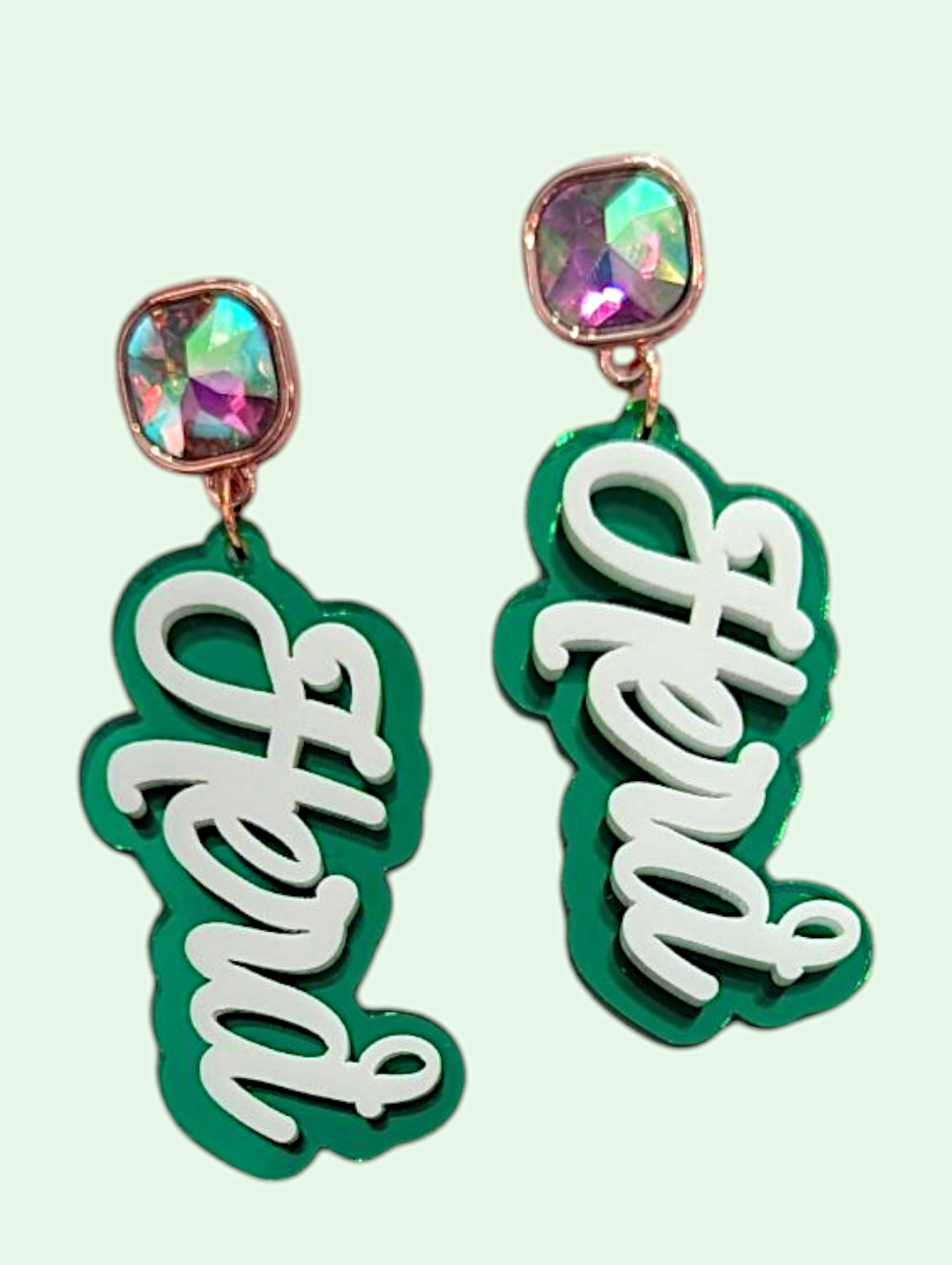 Earrings with herd text on a light green background