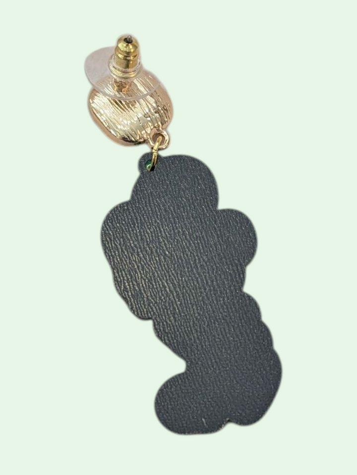 reverse side of earring with a dark gray pendant and gold accent on a light green background