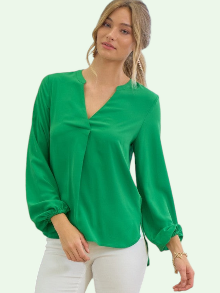 a model view of the anne blouse on a  blonde model