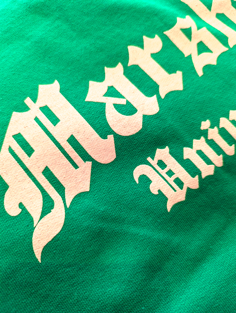 a close up of the print on the  antiquity crewneck