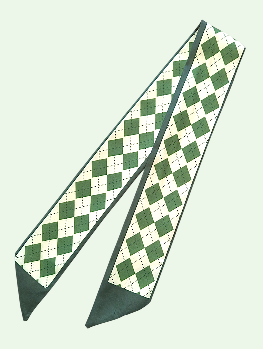 Two green and white checkered table runners on a light green background