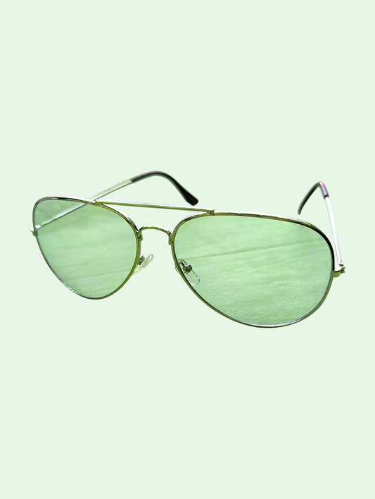 Green sunglasses on a light green background