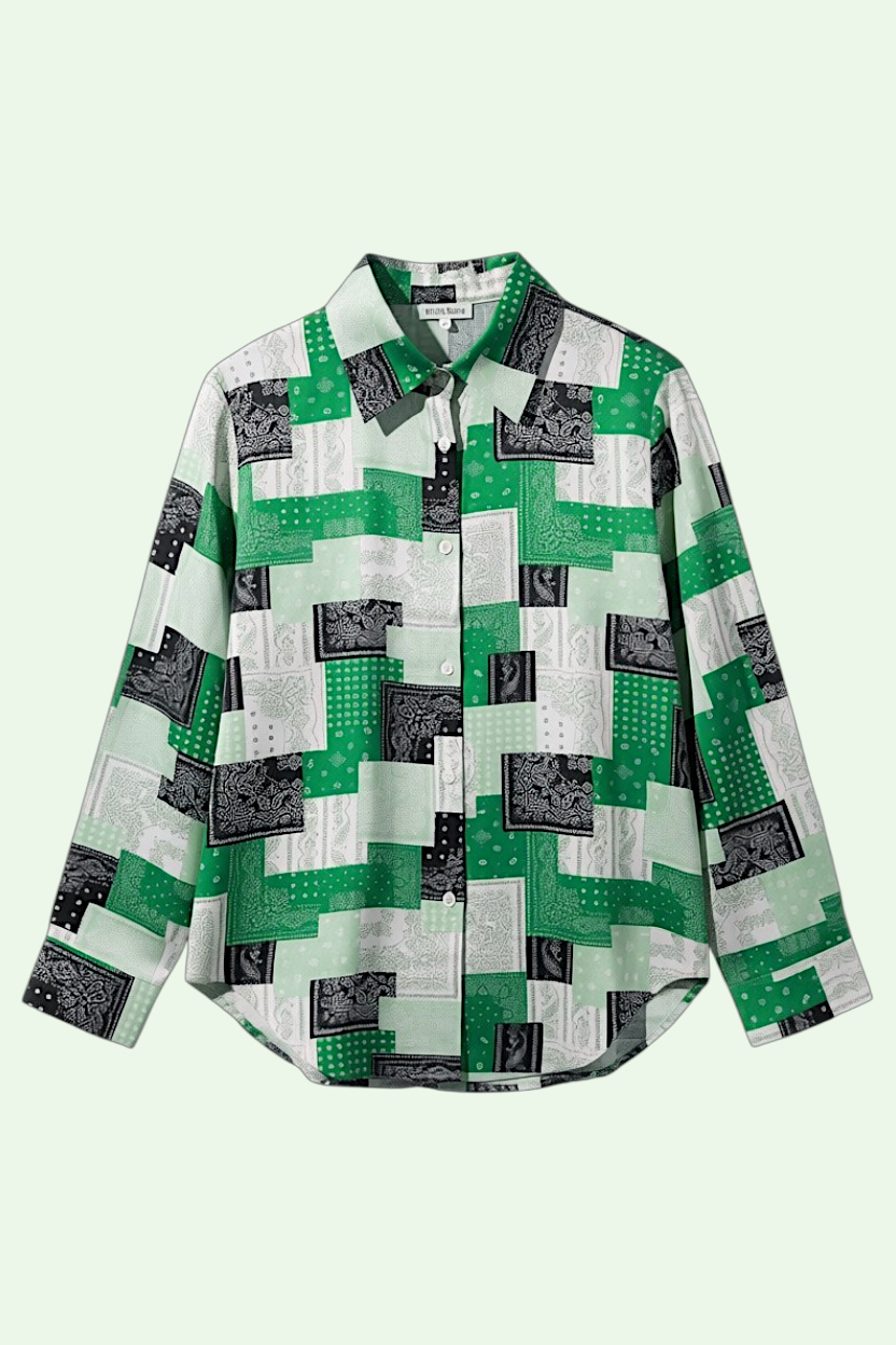 Green and black patterned shirt on a light green background