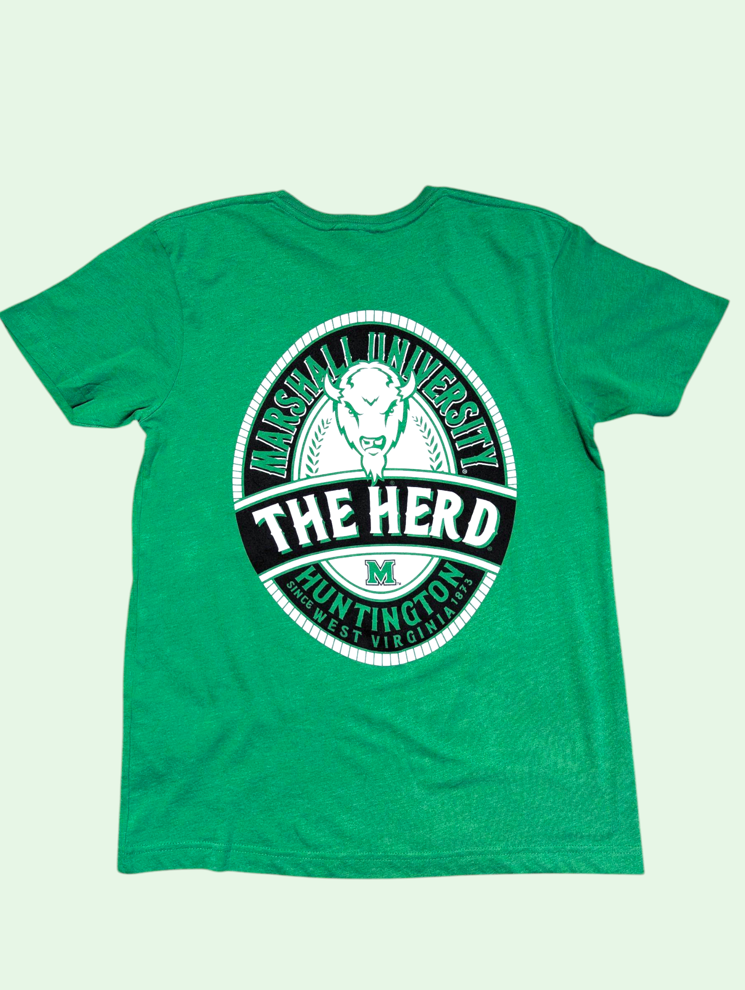 Green t-shirt with 'The Herd' logo on a light green background