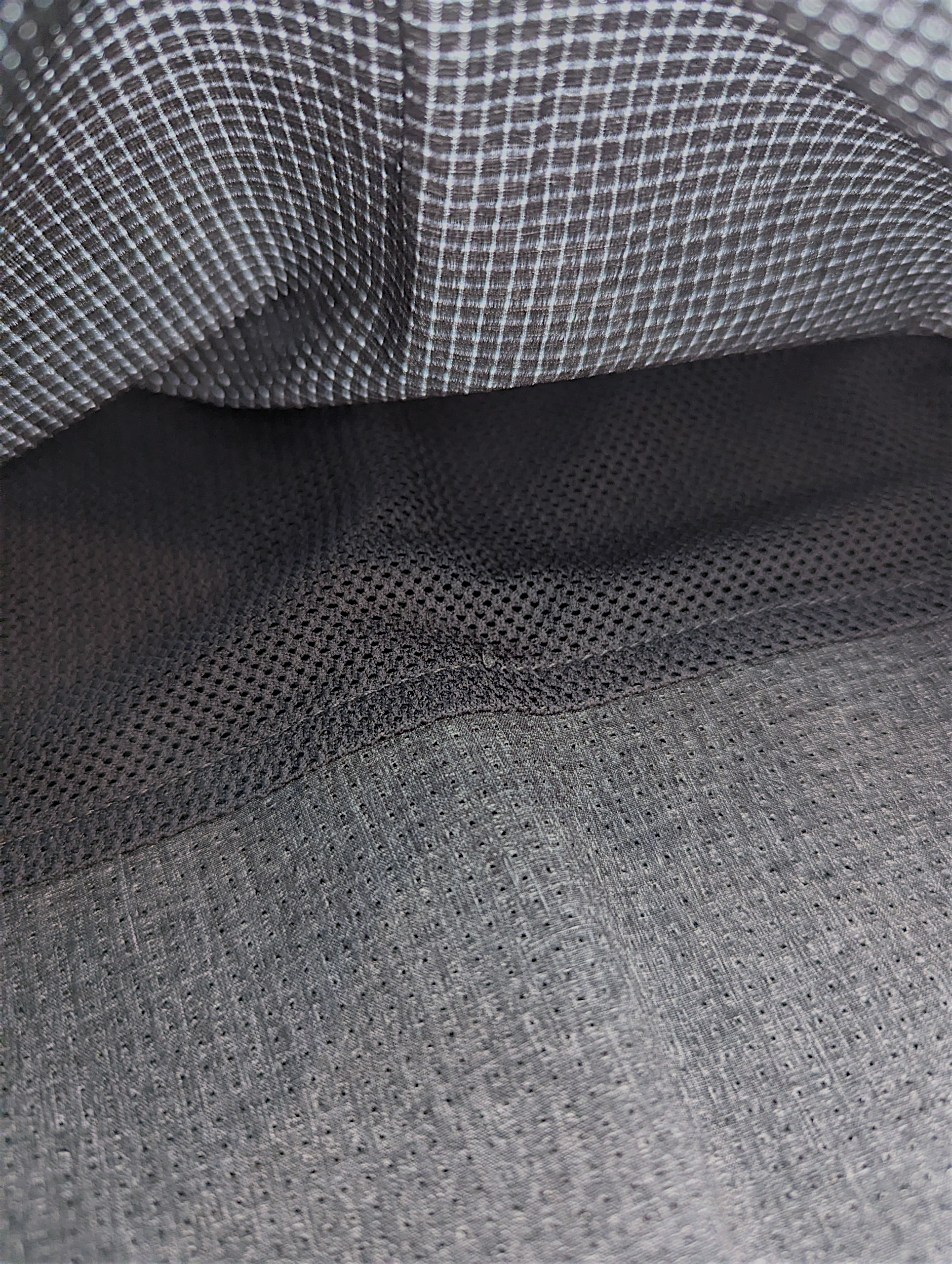 Close-up of gray fabric with a woven pattern