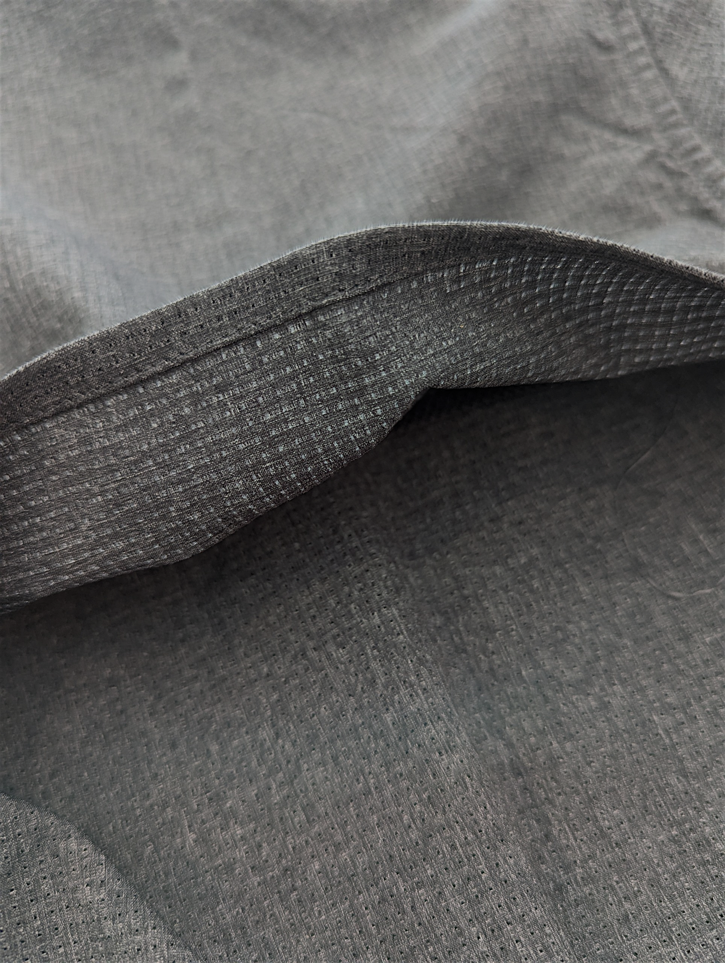Close-up of gray fabric with a textured pattern
