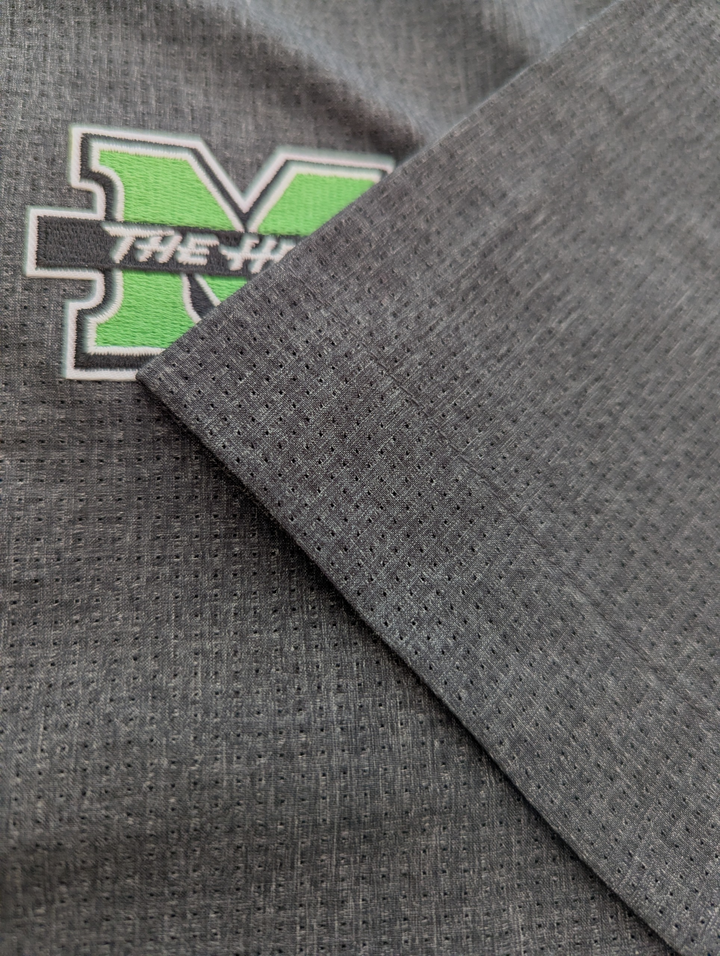 Gray fabric with a green and white logo on a gray background