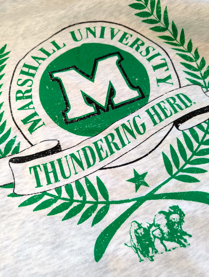 Marshall University logo with 'Thundering Herd' text on a textured background
