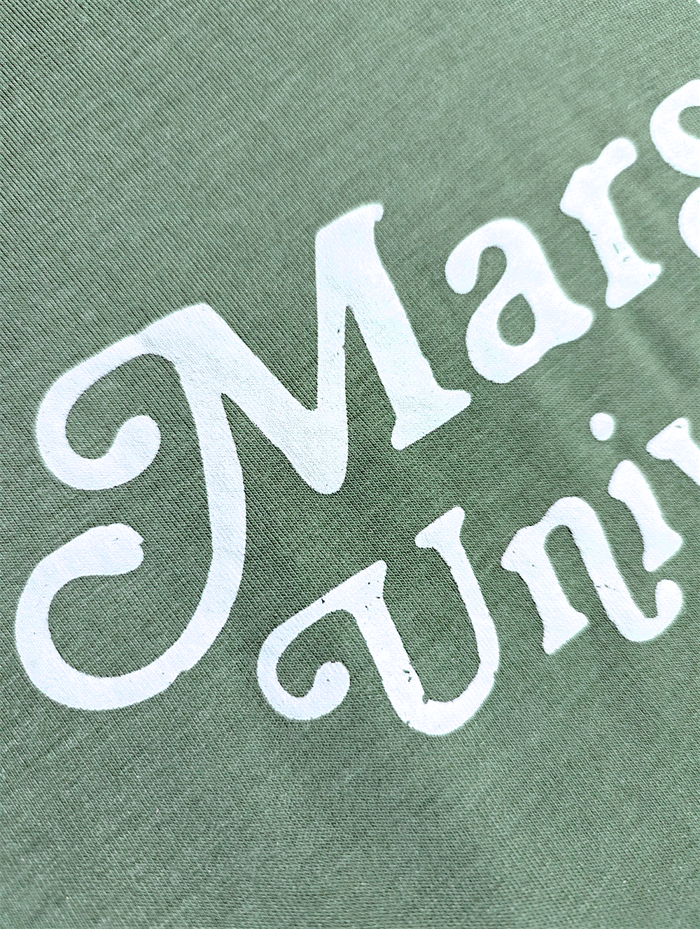 Text 'Marshall University' in white on a green background