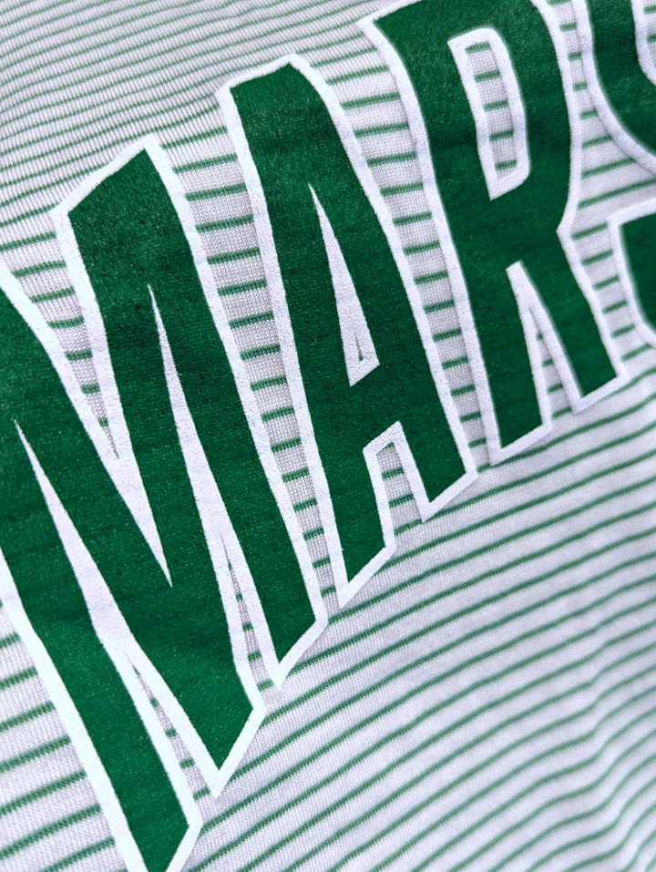 detail shot of the print and stripes on the day trip tee