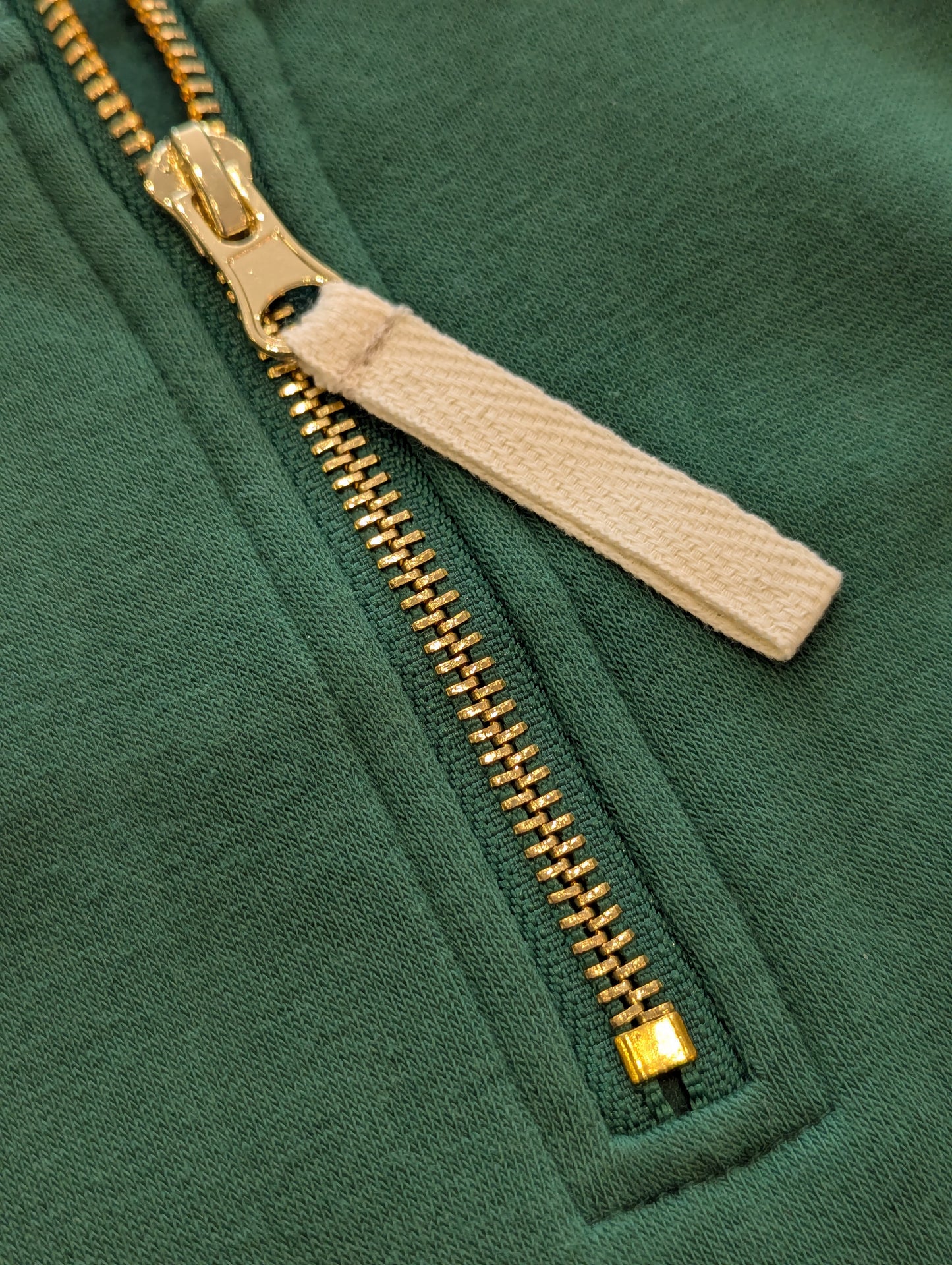detail of the zipper pull on the deena pullover