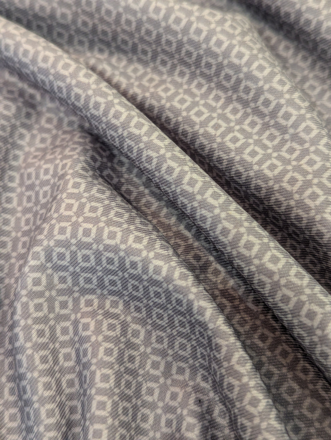 Close-up of patterned fabric with geometric design