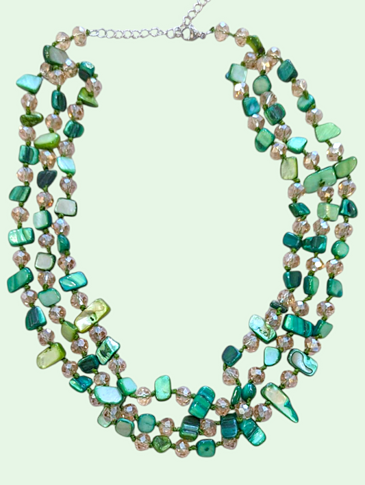 a studio shot of the evelyn shell necklace