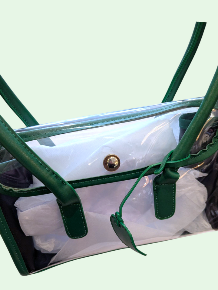 a detail shot of the fastener on the faux leather bag