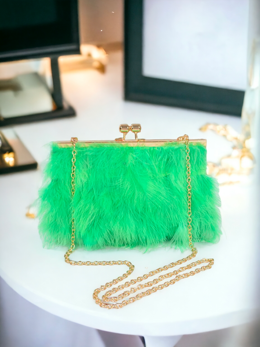 feather evening bag on a marble table