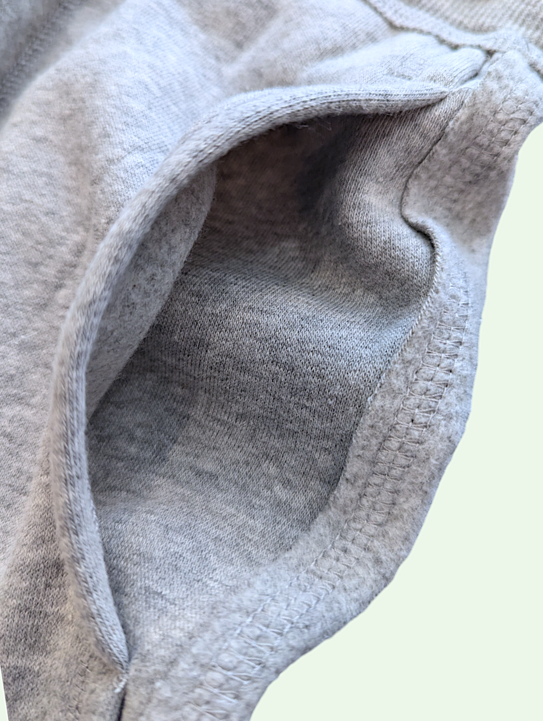 a detail shot of the pocket on the fleece pant