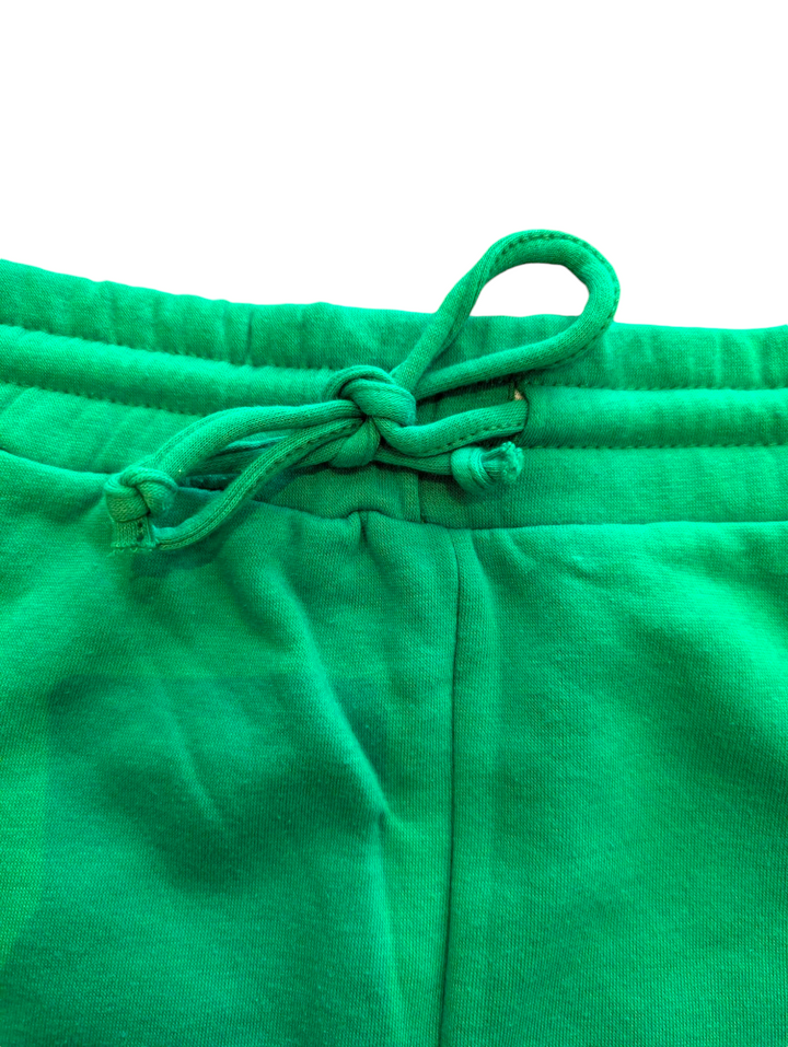 a close up shot of the waist on the fleece shorts