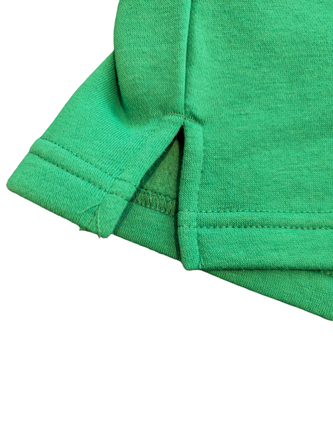 view of the slit detail on the fleece shorts