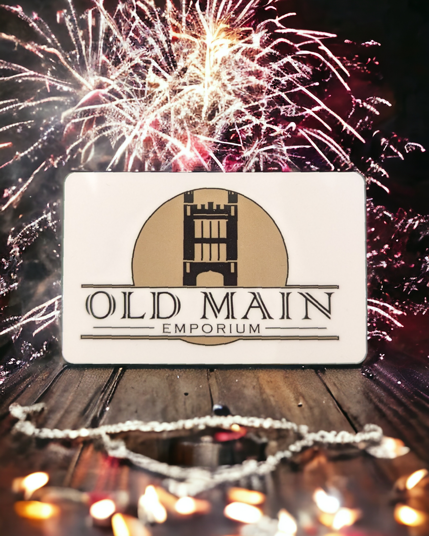 a shot of an OME gift card with fireworks in the background