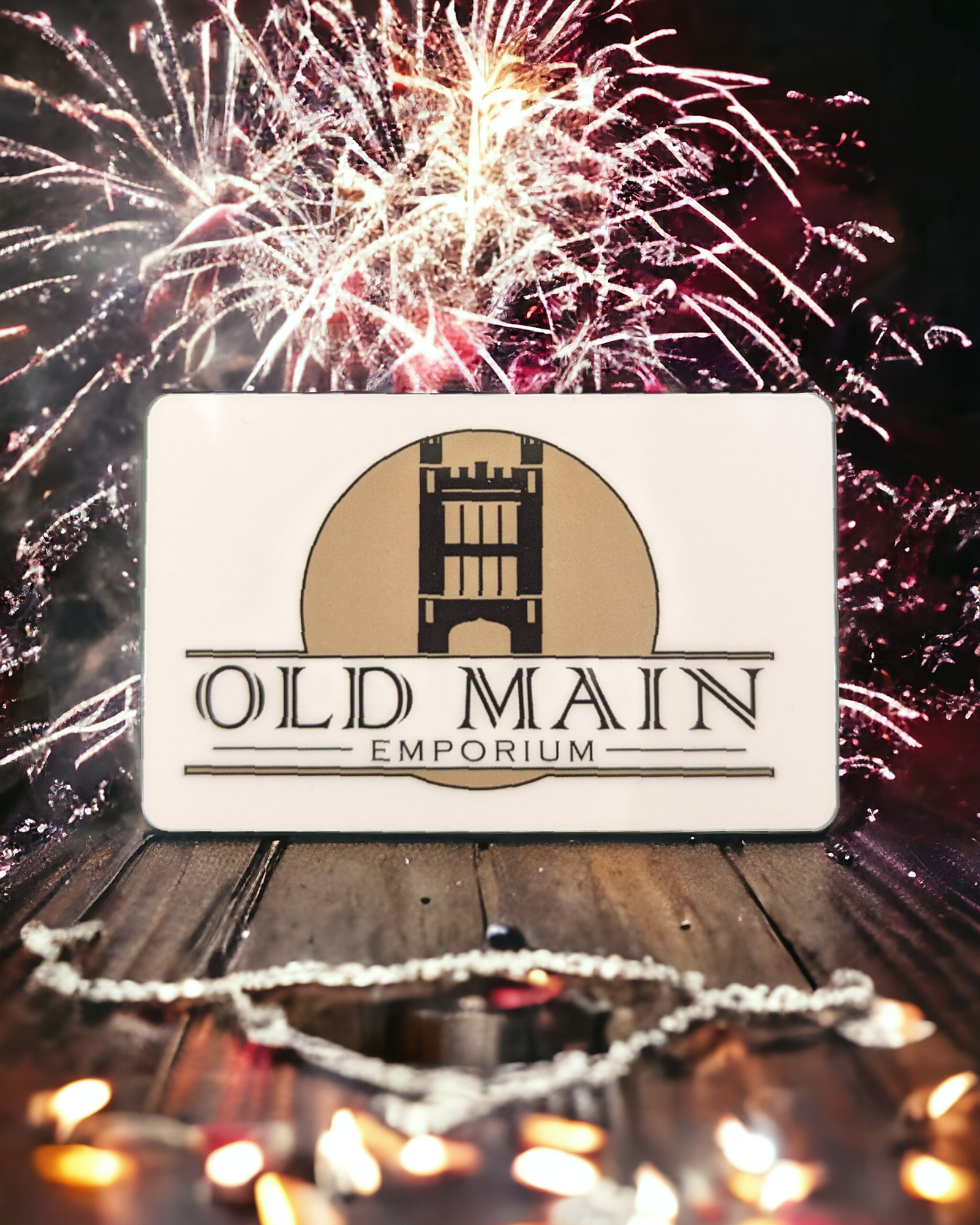 a shot of an OME gift card with fireworks in the background