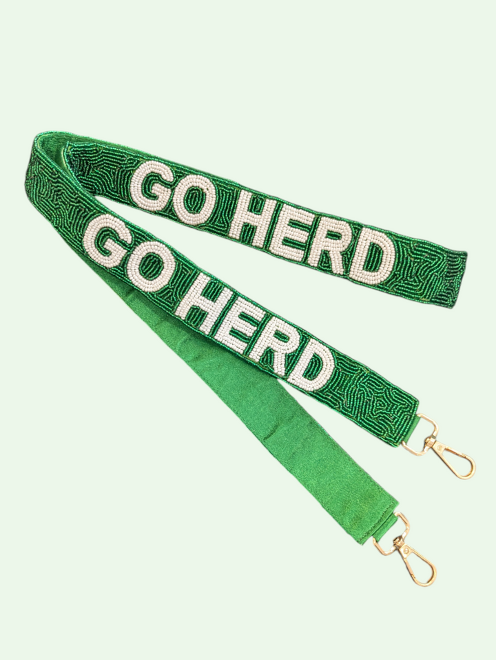 a studio shot of the go herd bag  and purse strap