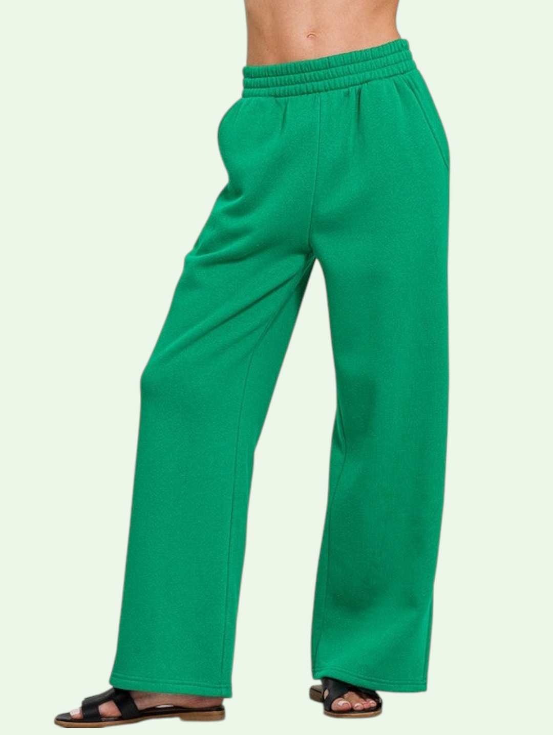 a front shot of the  green sweatpants