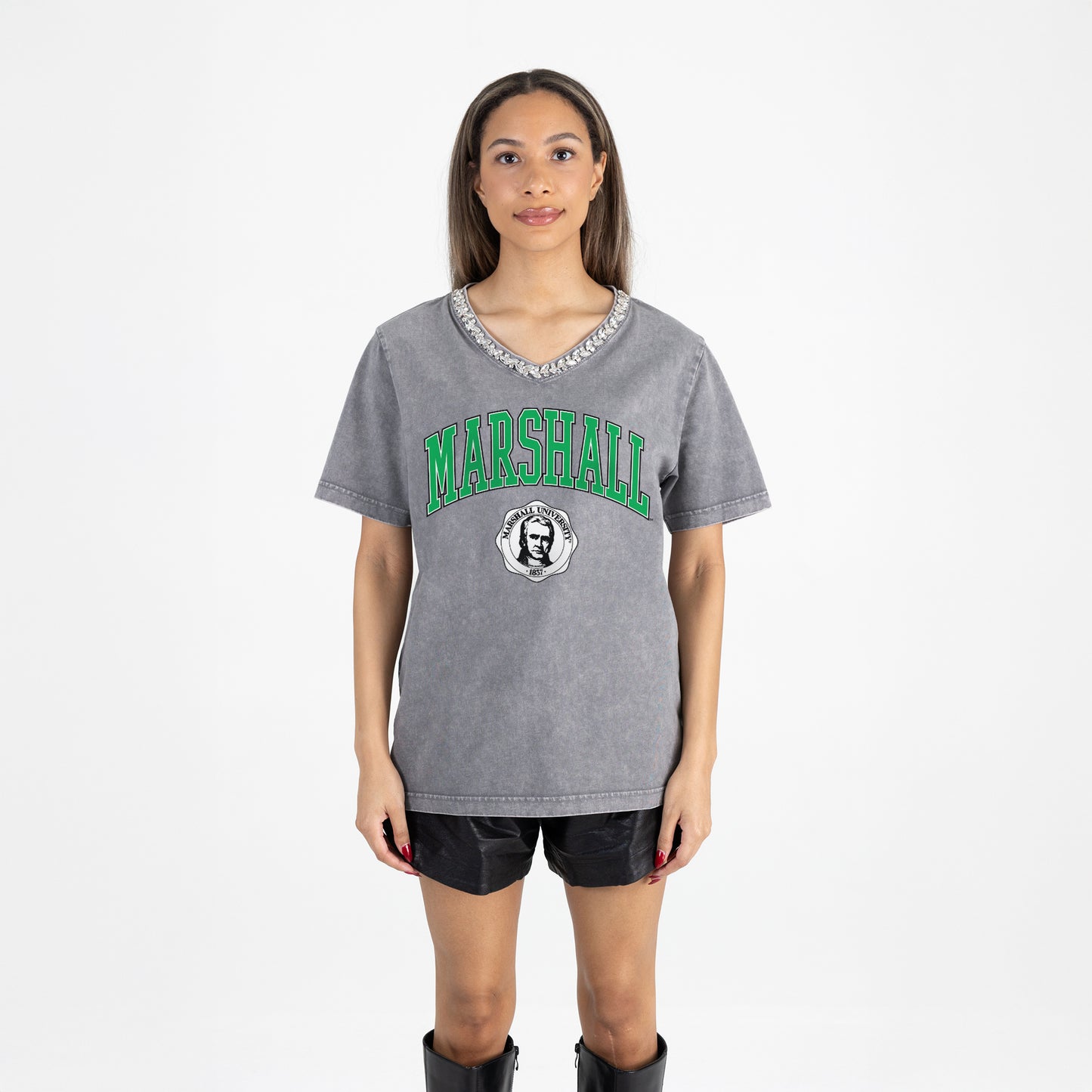 Person wearing a gray 'Marshall' t-shirt on a white background