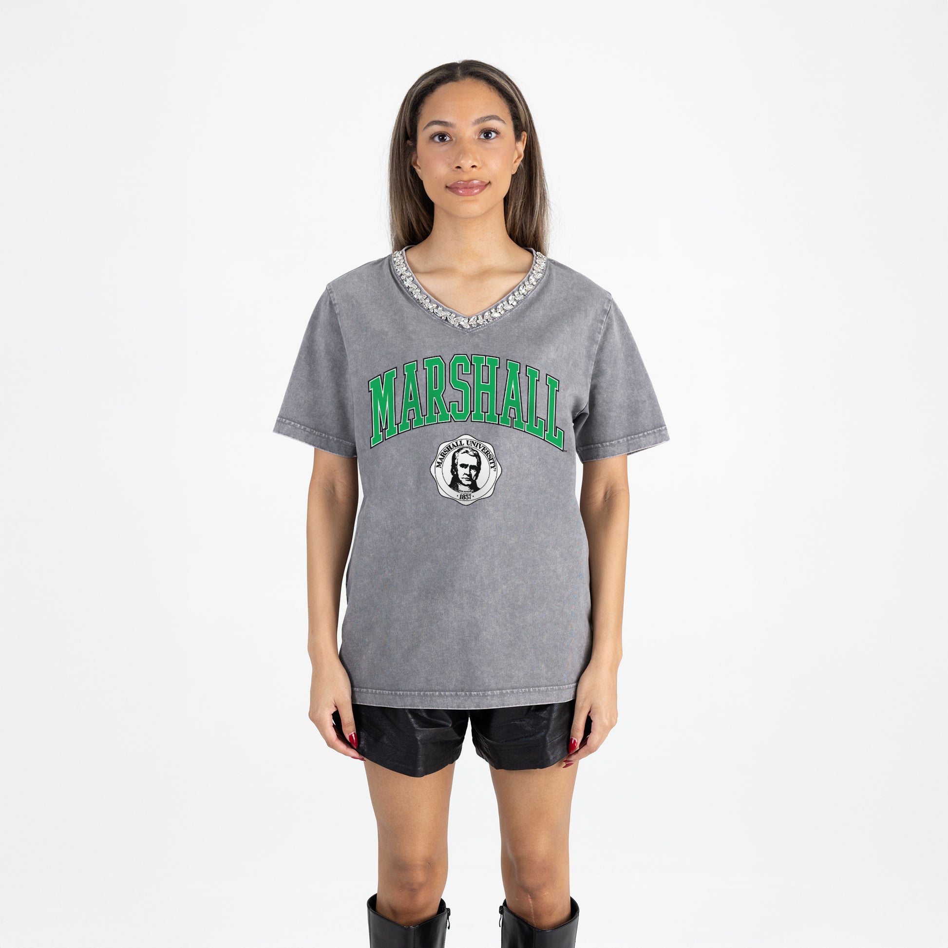 Person wearing a gray 'Marshall' t-shirt on a white background