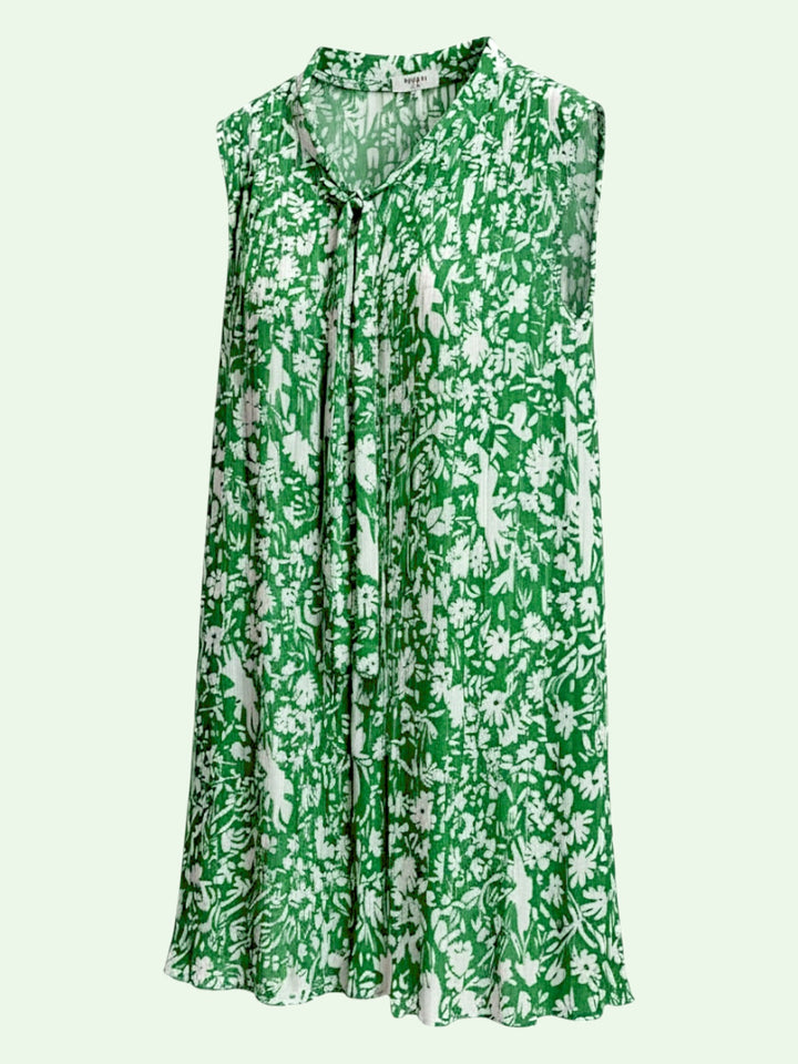 Green floral sleeveless dress on a light green background