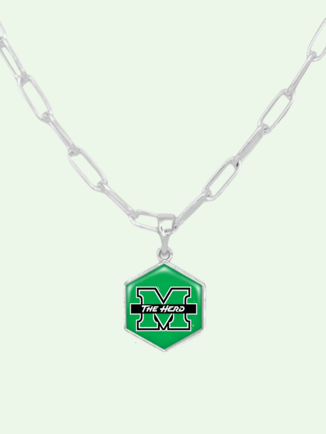 Necklace with a green hexagonal pendant featuring 'The Herd' logo on a white background