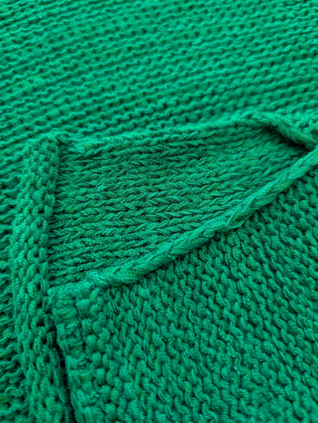 Close-up of a green textured fabric