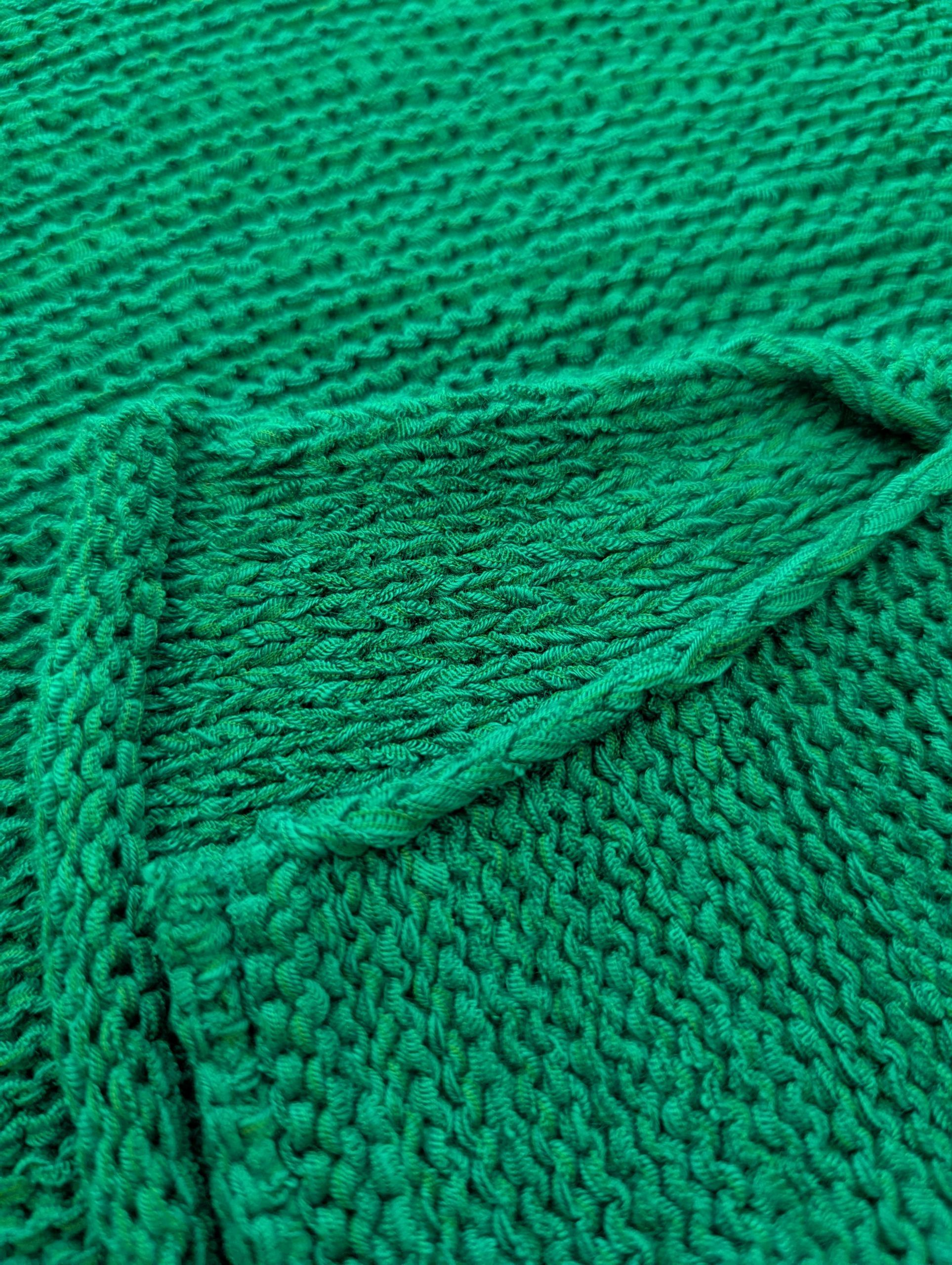 Close-up of a green textured fabric