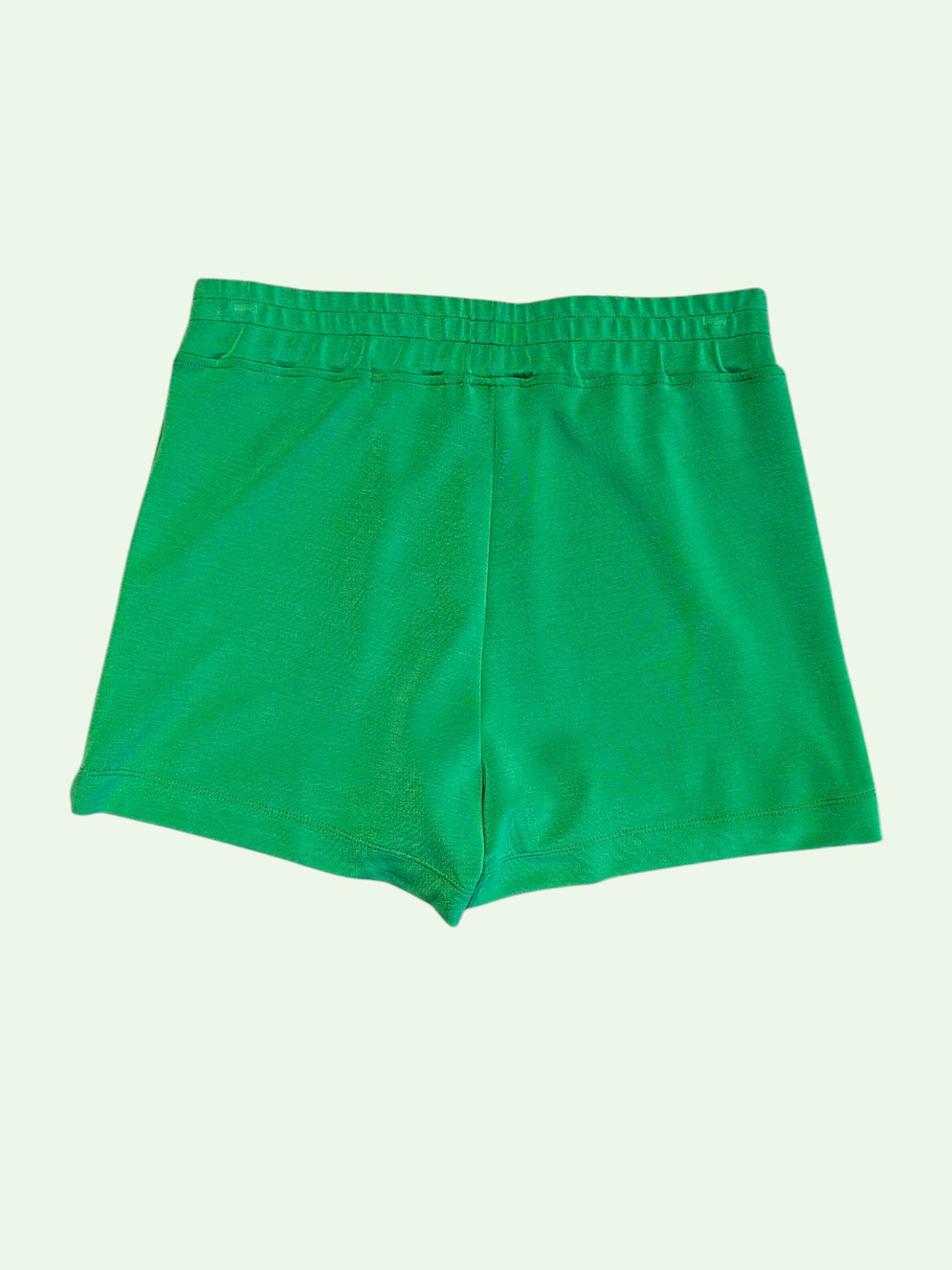 Green shorts on a green
 background