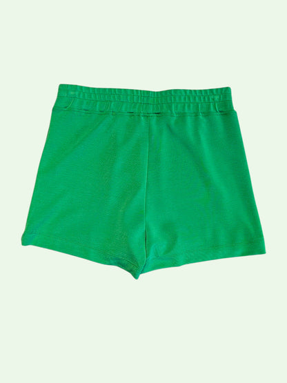 Green shorts on a green
 background