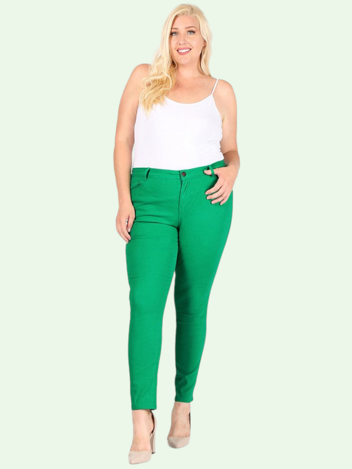 a full length shot of a blonde model in the kelly green stretch pants