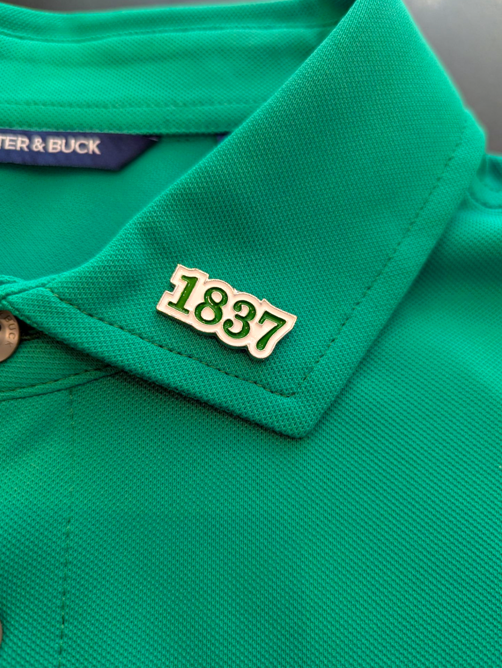 the 1837 pin on a collar