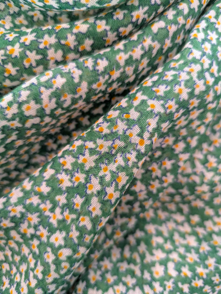 a close-up view of the daisy design on the lilian scarf