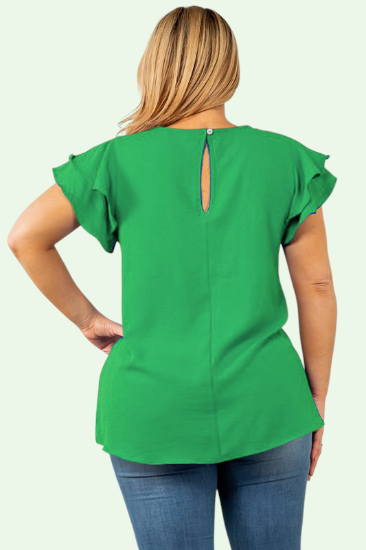 Green blouse with ruffled sleeves worn by a person on a white background