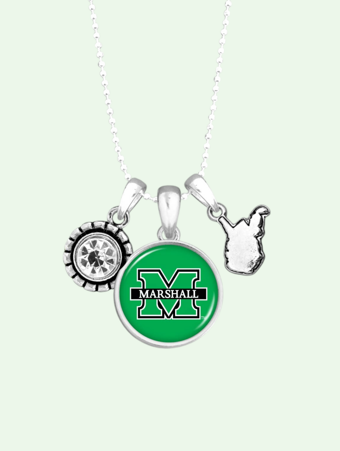 studio shot showing the necklace with a jewel,a marshall logo on a disc and a tiny WV charm